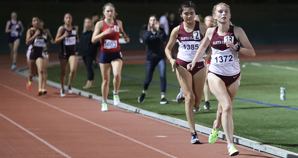 Allison Martinez (far right) and Marisa Sanchez (bib 1385) are two of seven women's runners in the 3,000-meter race on Saturday night.