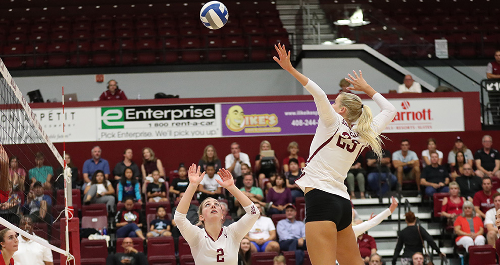 Jensen Cunningham (right) tallied career-high marks of 19 kills and 17 digs against Gonzaga on Thursday night.