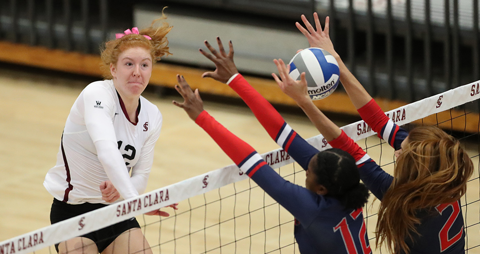 Chloe Loreen tools the block in a five-set victory over Saint Mary's on Saturday, Oct. 21 in Leavey Center. The freshman outside hitter logged her fourth straight double-double in the victory.