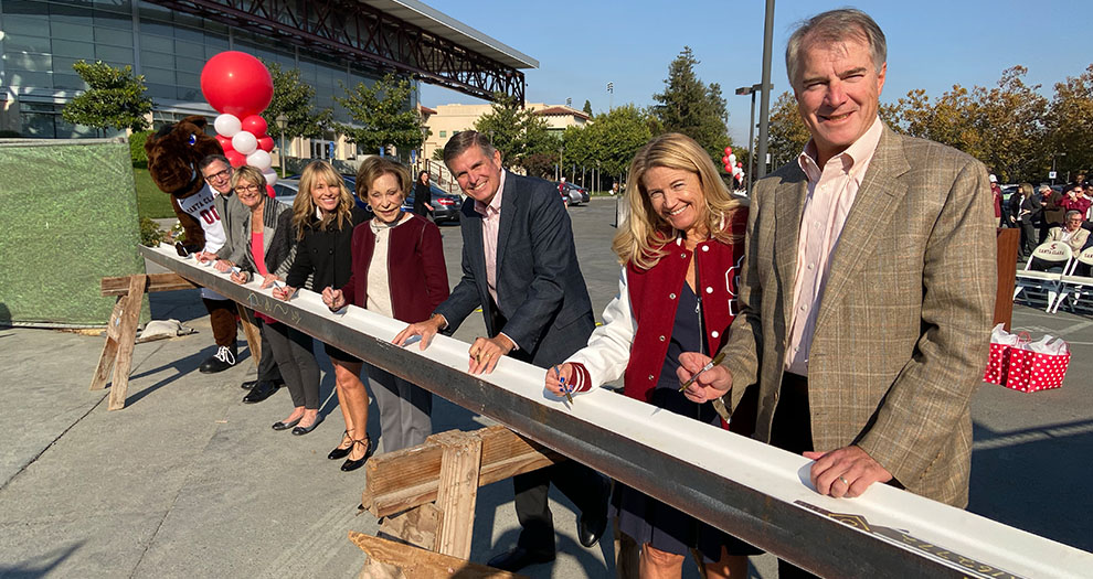 Donors Lead Beam Signing for Athletic Excellence Center