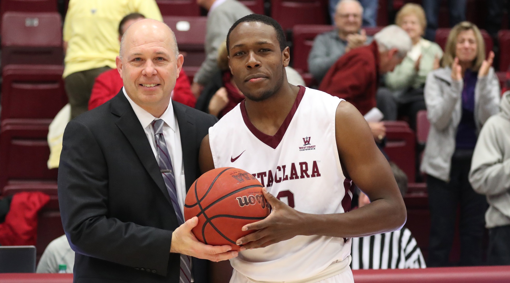 Herb Sendek presented Jared Brownridge with the game ball for reaching 2,000 career points.
